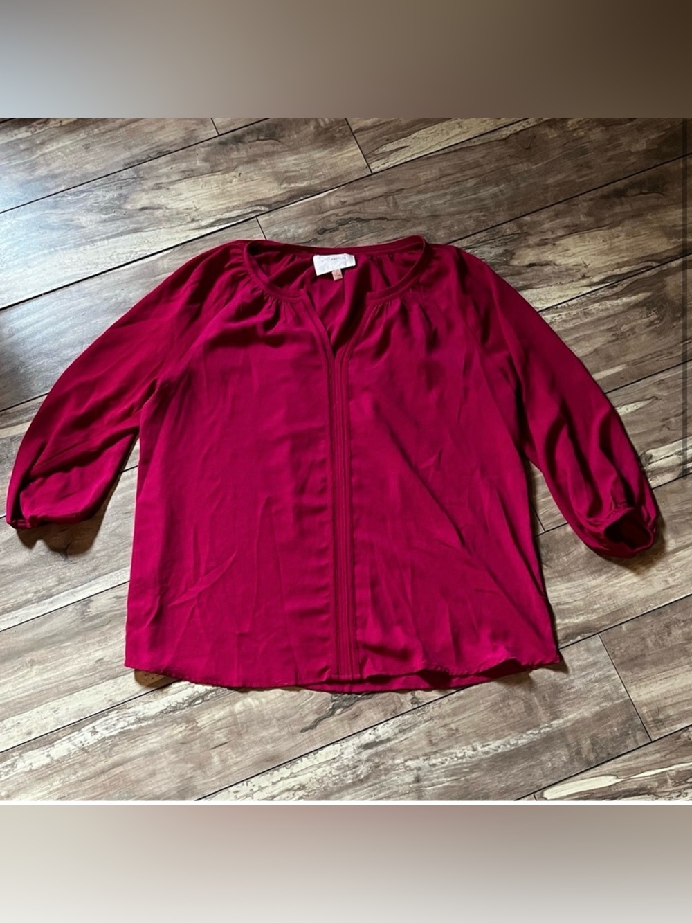 Skies are Blue pink blouse with three-quarter sleeves and a v-neckline